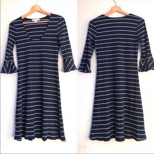 Amour Vert striped navy blue and white dress
Size Medium
